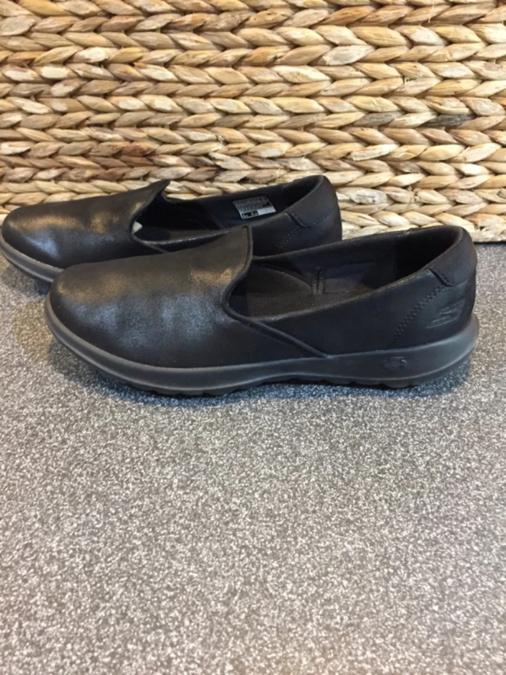 Skechers black slip